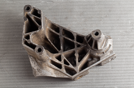 A cast bracket — one clear angle, the part fills the frame